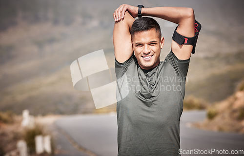 Image of Exercise, portrait and man stretching outdoor for fitness, workout and training for energy, balance and wellness. Male person, athlete and stretch arms on road, smile and sports for healthy lifestyle