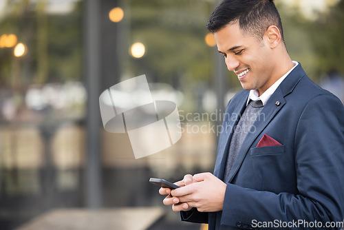 Image of Happy, travel or business man with phone for networking, social media or communication in London street. Search, smile or manager with smartphone for research, internet or blog content review outdoor