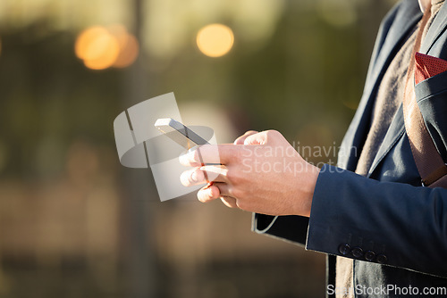 Image of Business man, travel or hands with phone for networking, social media or communication in London street. Search, zoom or manager with smartphone for research, internet or blog content review outdoor