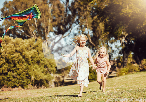 Image of Kite, running and children running in an outdoor park with summer fun and smile. Nature, kids vacation and happiness of kids ind sunshine with freedom and smiling bonding together on green grass