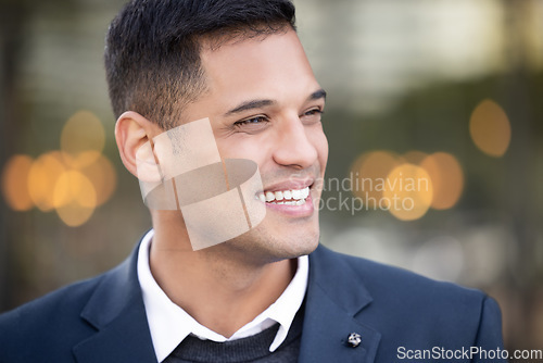 Image of Business man, smile and city bokeh lights with a young professional feeling happy about work. Outdoor, worker and happiness of a businessman ready for working with success and proud smiling outdoor