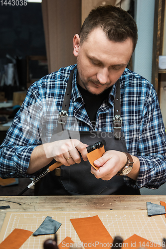 Image of Concept of handmade craft production of leather goods.