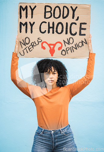 Image of Equality, feminism and portrait of a woman with a sign for human rights, abortion or political opinion. Protest, march and female from Mexico with a feminist board for change, empowerment and justice