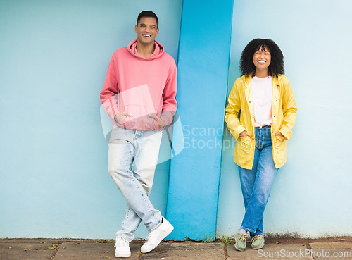 Image of Couple of friends, bonding or portrait on isolated blue background in fashion, afro hair trend or cool style clothes. Smile, happy man or black woman on mock up backdrop, city wall or Brazil mockup