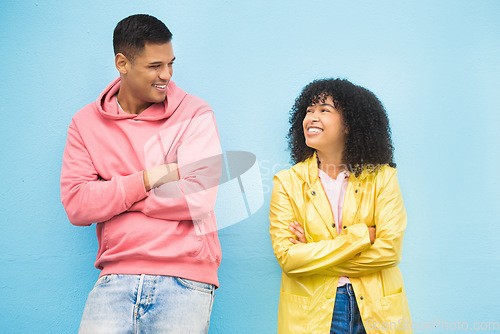 Image of Couple of friends, happy and arms crossed on isolated blue background in city bonding, support and fun city travel. Smile, happy man or black woman and confidence, afro hair or fashion clothes mockup