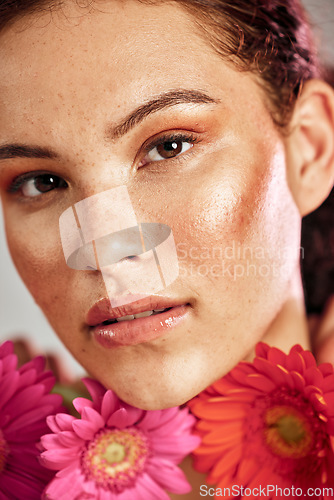 Image of Beauty portrait, woman and flowers for skincare dermatology, makeup and cosmetics. Facial, wellness and self care for skin glow, daisy product and face freckles of a healthy model for floral headshot