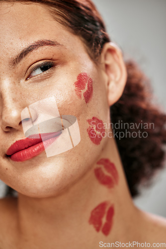 Image of Makeup, lipstick kiss and beauty of woman model in studio for cosmetics, love and glow on skin. Headshot of aesthetic person with red color lips for valentines day facial idea or skincare motivation