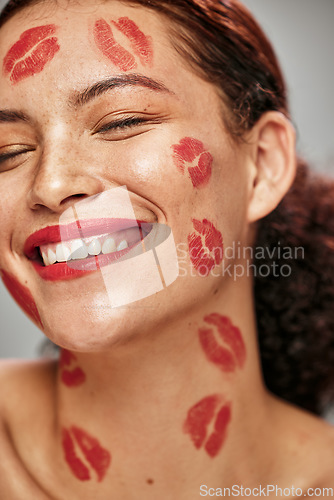 Image of Face, red lipstick kiss and makeup on face model woman in studio for cosmetics and happiness. Headshot of aesthetic person happy about love for valentines day spa facial or skincare motivation