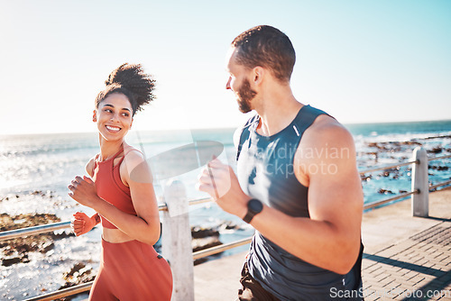 Image of Running, fitness and sea with a sports couple outdoor during summer for cardio or endurance exercise. Health, training and ocean with a man and woman runner on a promenade for a workout together