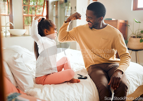 Image of Healthcare, diabetes and muscle of father and girl in bedroom for brave, proud and strong gesture. Love, family home and dad helping child with monitor for glucose, sugar level test and insulin