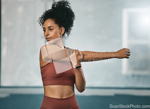 Image of Black woman, stretching arms and fitness exercise for cardio training. wellness workout and mindset motivation. African athlete, runner warm up ready and body stretch routine in sports health gym