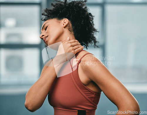 Image of Fitness, neck pain or black woman in gym with pain or injury after workout exercises or body training alone. Emergency, African girl or injured sports athlete holding sore muscle after bad accident