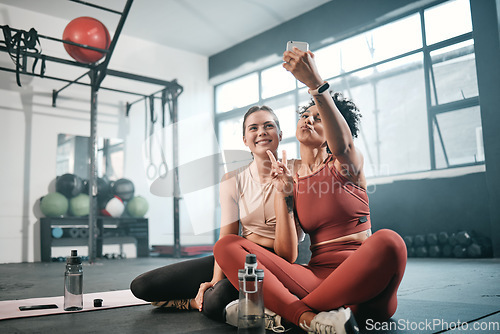 Image of Gym, phone or friends take a selfie with peace sign after fitness training, workout or exercise for social media. Memory, sports girls or happy women take a photo or picture relaxing on fun break