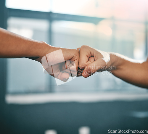 Image of Fitness, motivation or hands fist bump at gym in a workout exercises or training with team work. Partnership, success or healthy sports people exercising together for growth, support or collaboration