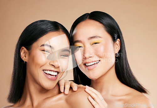 Image of Portrait, beauty and diversity with woman friends in studio on a beige background for skincare. Face, skin and wellness with a young female and friend posing to model or promote a cosmetic product