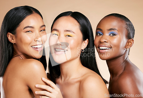 Image of Beauty, makeup and portrait of women in studio for wellness, hygiene and grooming on brown background. Face, friends and eyeshadow by girl for different, skin and luxury skincare, relax and isolated