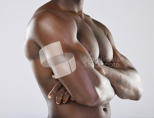 Image of Black man, strong arms and muscle for fitness, exercise workout and bodybuilder sports wellness. African male, arm health wellness mockup and model skincare or model body care in white background