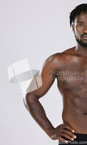 Image of Half, portrait and black man body in studio for wellness, grooming and akimbo on grey background. Muscular, man and beauty routine on mockup, relax and skincare treatment on shirtless model isolated