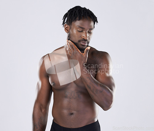 Image of Black man, skincare and fitness portrait with body sports person in studio for strong muscle and power. Health and wellness of a sexy male bodybuilder with growth after exercise, workout and training