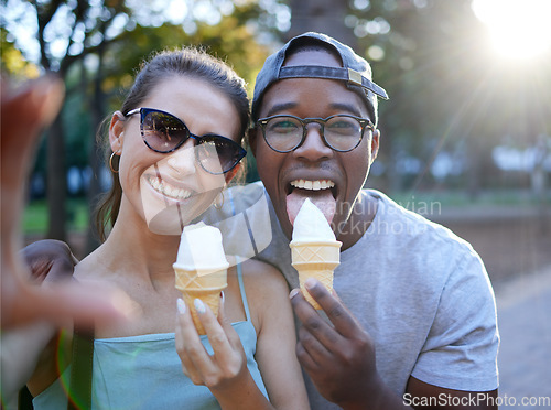 Image of Love, ice cream or couple take a selfie in a park on a romantic date in nature in an interracial marriage. Pictures, black man or happy woman eating or enjoying a snack on holiday vacation