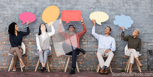 Image of Speech bubble, communication and idea with business people and mockup for social media, vote and review. Design, contact and chat sign with employee and board at brick wall for voice and opinion