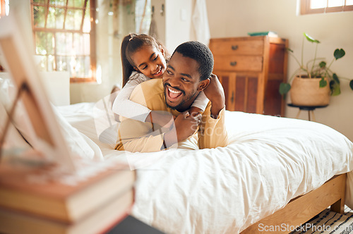 Image of Happy, playing and father and daughter in bedroom for bonding, support and affectionate. Smile, happiness and laughing with dad and child in black family home for care, quality time and playful