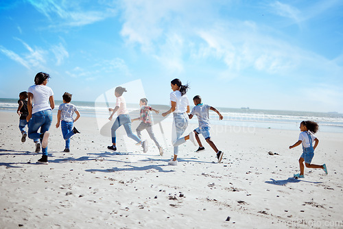 Image of Running family, beach and adoption kids with happiness, bonding and sand with speed on summer vacation. Women, children and happy workout for group on holiday by ocean with diversity, love and care