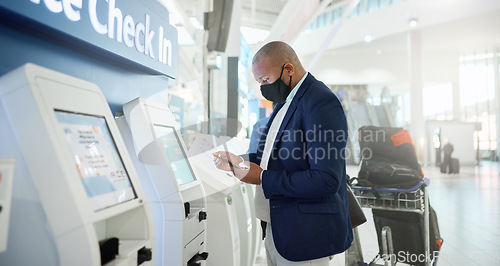 Image of Black man, mask and checking phone in airport for corporate travel information, destination details and flight ticket. African businessman, digital communication and smartphone, check in and safety