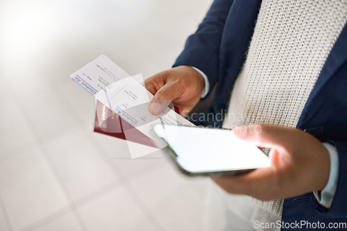 Image of Hands, phone and passport with ticket for travel, schedule or checking flight times on mobile app at a airport. Hand of business employee holding smartphone, screen or ID document for trip or journey
