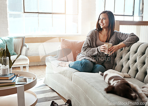 Image of Relax, morning tea and woman with dog on a home living room couch feeling calm with happy lifestyle. Happiness and smile of person with puppy thinking with coffee on peaceful lounge day in a house