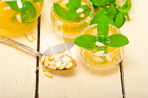 Image of Arab traditional mint and pine nuts tea