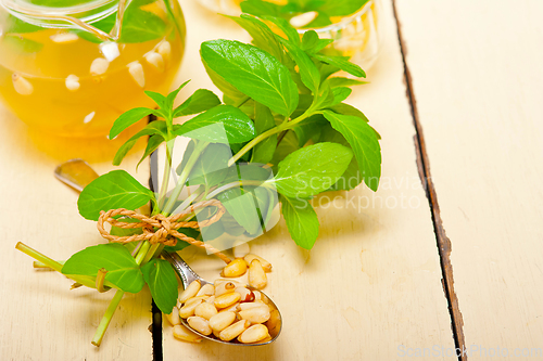 Image of Arab traditional mint and pine nuts tea