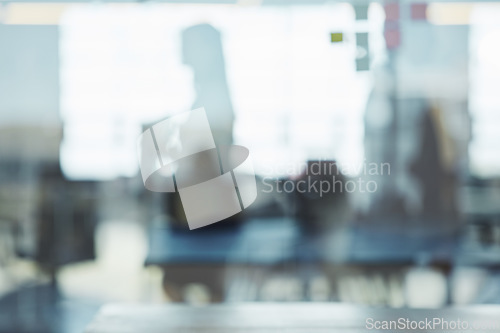 Image of Reflection, glass and shadow of person in window while working at a corporate company. Professional, workplace and silhouette of blur employee in the office for work, meeting or coworking at agency