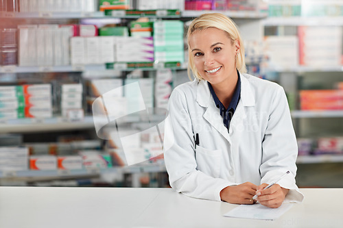 Image of Pharmacist, happy portrait and medical worker ready for medical support, wellness and standing pharmaceutical drug store. Woman, nurse smile and healthcare medicine industry for pharmacy headshot