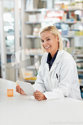 Image of Pharmacist, woman and portrait with health and tablet for digital info on pills and medicine in pharmacy. Technology, healthcare and medical store with internet research on pharmaceutical drugs