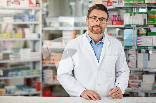 Image of Pharmacy, writing and pharmacist man in portrait for medicine, product or healthcare insurance document. Trust, help desk and medical professional worker receipt, doctor note or prescription stock