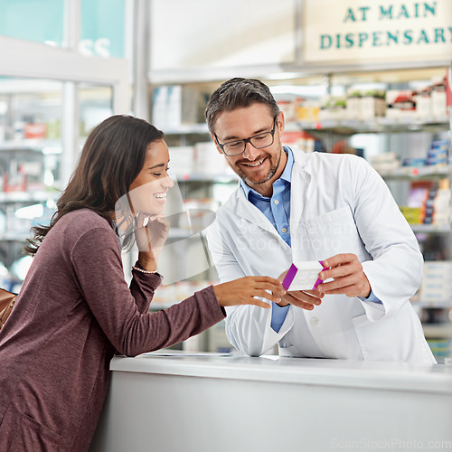 Image of Happy, medicine and pharmacy worker with customer for help, recommendation and expertise at counter. Pharmaceutical advice and opinion of pharmacist helping girl with medication information at store.