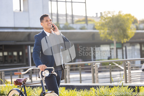 Image of Phone call, bike and commute with a business man in the city using eco friendly transport for work travel. Mobile, bicycle and communication with a male employee thinking about his carbon footprint