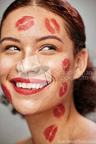 Image of Beauty woman, lipstick kiss and happy face of makeup model in studio for cosmetics and love. Headshot of aesthetic person thinking color for valentines day spa facial idea or skincare motivation