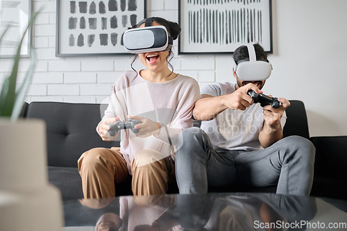 Image of VR, gaming and metaverse with a couple playing video games in their home together for fun or enjoyment. Virtual reality, game and 3d ai with a man and woman gamer bonding in a house living room