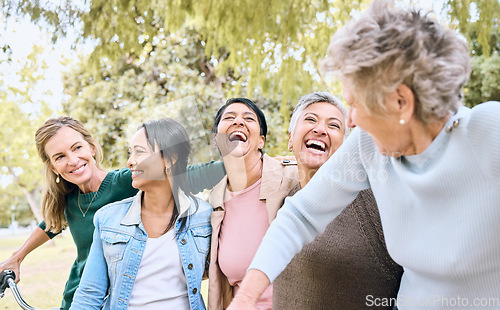 Image of Senior women, park and friends laughing at funny joke, crazy meme or comedy outdoors. Comic, happy or group of retired females with humor bonding, talking and enjoying quality time together in nature