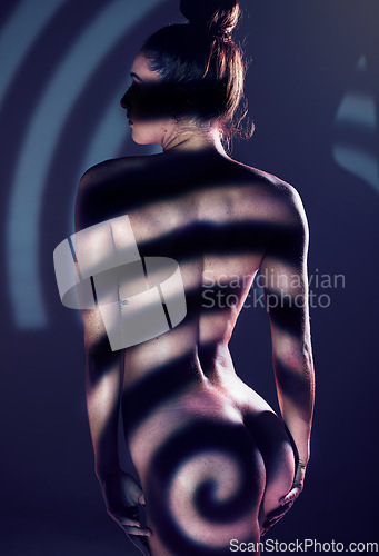 Image of Spiral, beauty and body of naked woman in studio isolated on a background. Skincare, butt and hips of creative, sexy and sensual female model and nude girl with sexual desire and erotic art aesthetic