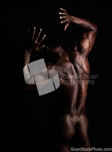 Image of Nude, sexy body and strong black man in dark studio for art, muscle power and sexuality. Sports person or bodybuilder model naked for motivation, health and wellness for self care background