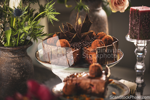 Image of chocolate mousse cake with cherry