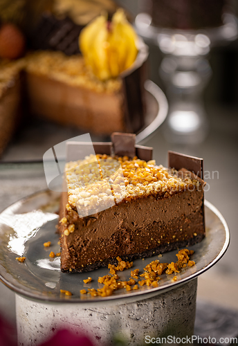 Image of Close up of layered chocolate mousse cake