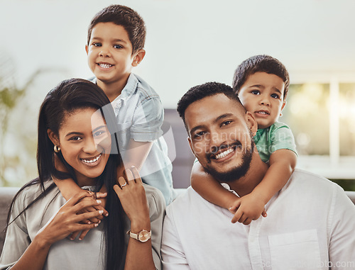 Image of Mother, father and children hugging parents with smile relaxing together for holiday or weekend at home. Portrait of happy mom, dad and kids smiling for hug, love or care in relax for family time