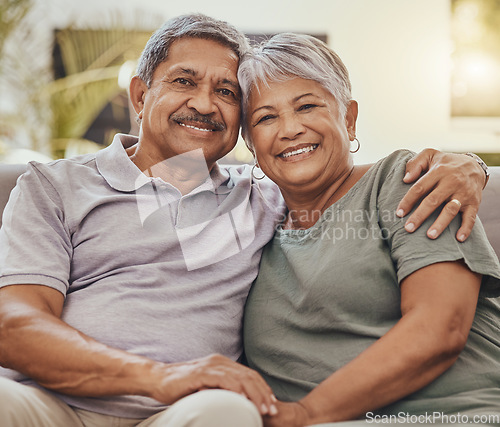 Image of Senior couple, portrait at home of elderly people happy about marriage, love and retirement. Relax, happiness and house sofa with an old woman and man together with care and hug feeling peace