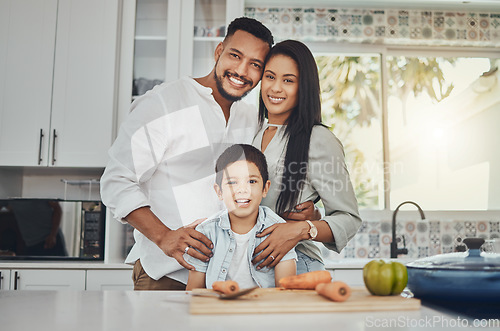 Image of Kitchen, family and portrait of mother, father and young child together cooking with happiness. Happy, smile and parent love of children in a house making food for dinner ready for eating at home