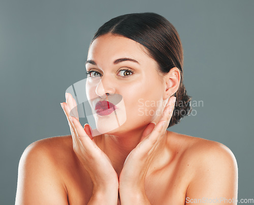 Image of Woman lips with lipstick, kiss face and makeup with red cosmetics and playful pout isolated on studio background. Portrait, beauty and skincare with cosmetic care, wellness and glow, facial and fun