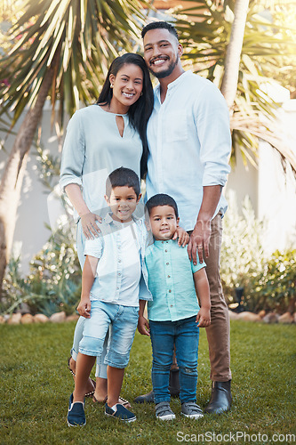 Image of Family, portrait and garden of a mother, father and children outside house happy about real estate. Happiness, smile and parent youth love of a mom and kids together on grass outdoor in summer